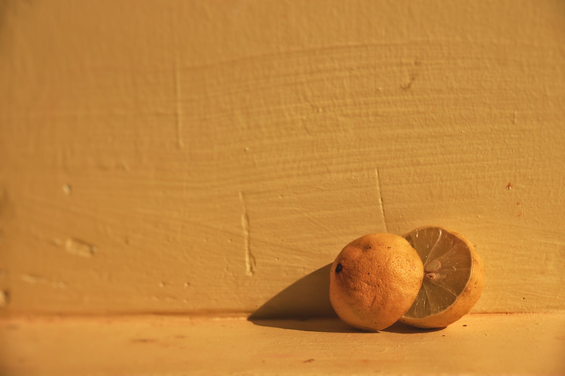 slices of lemons near wall